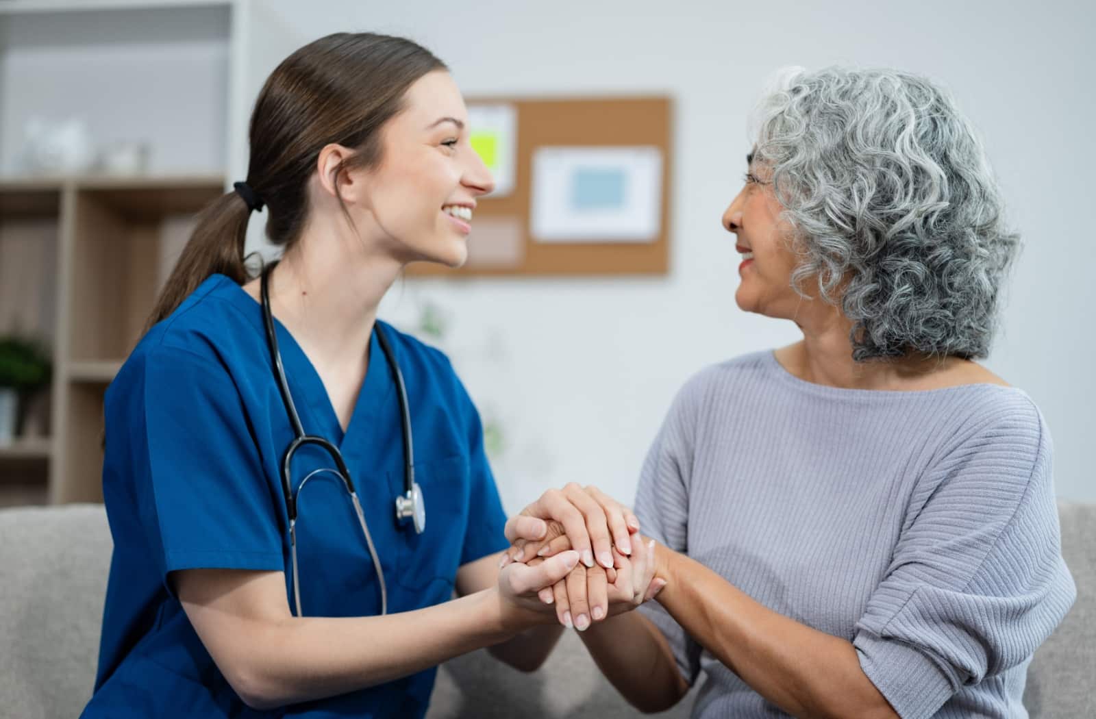 A senior woman getting a regular checkup with her female doctor.